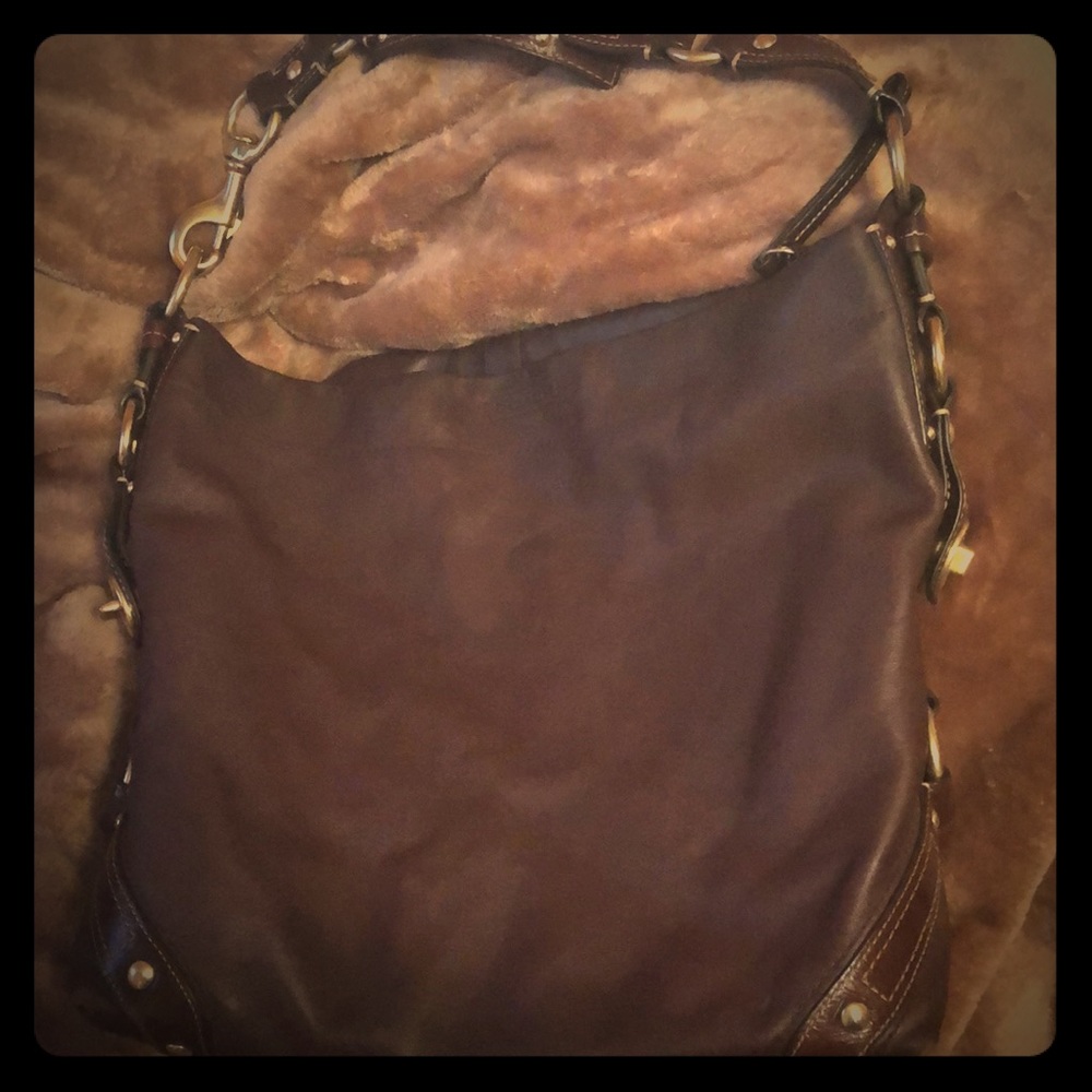 Coach leather shoulder bag with red silk interior